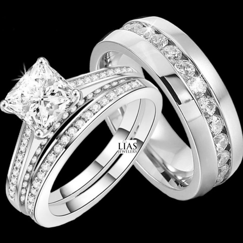 New 18k white gold wedding ring set and men's wedding band. His and Hers